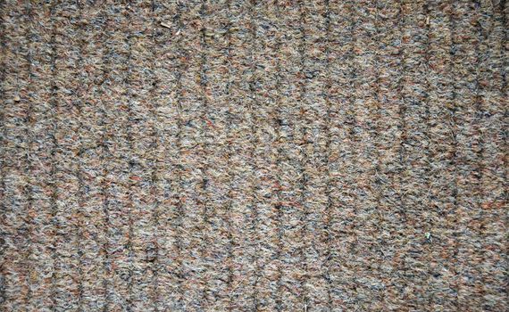 carpet lines as a grey brown background or wallpaper