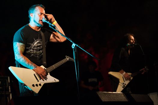 CANARY ISLANDS, SPAIN-JUNE 30: Brigido Duque(l) and Rafael Redin(r) from the band Koma, from Navarra in Spain, perform during Cebollinazo Rock in Galdar on June 30, 2012 in Canary Islands, Spain
