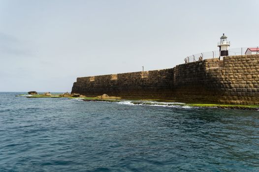 The view of historic sea walls in ancient Acre (Akko), Israel