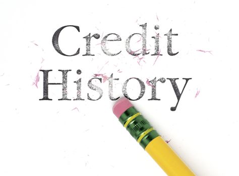 Close up of a yellow pencil erasing the words, 'Credit History.' Isolated on white.