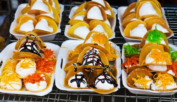 Thailand dessert style  of crispy crepes in market