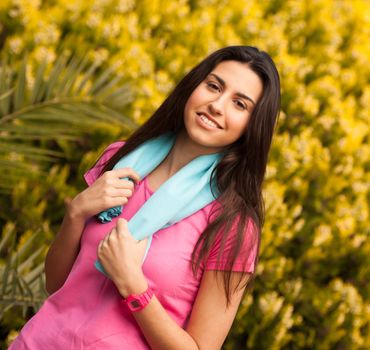 Sport woman with blue towell enjoying after fitness session