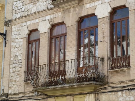 old balcony on the front of and old building