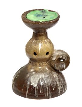 Ceramic candlestick with wax isolated on white background.