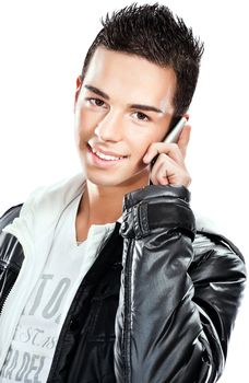 Pretty boy talking over mobile phone, isolated on white background