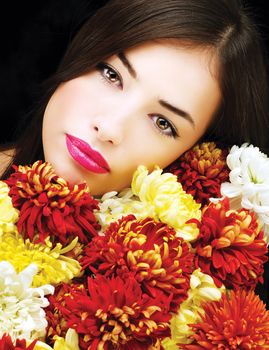 Pretty woman face with flowers