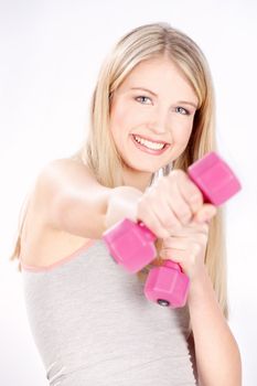 Smiled blond hair woman doing fitness exercises