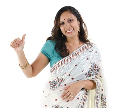 Beautiful Indian woman showing thumb up hand sign on white background