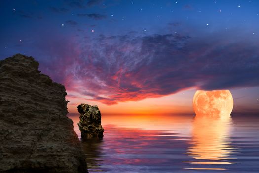 Colourful landscape with big moon and rock at the ocean, sky reflected in water