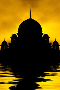 Silhouette of a mosque in sunset with water reflection