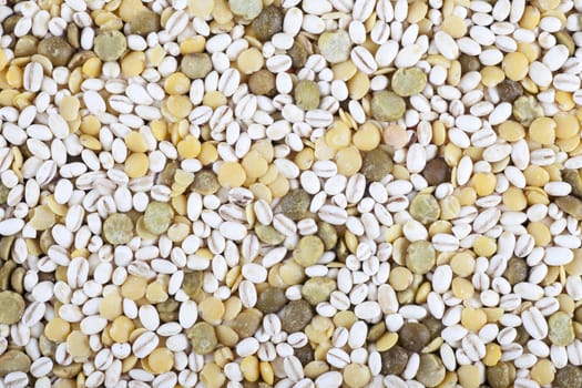 Food texture of green and yellow lentils and barley grains.