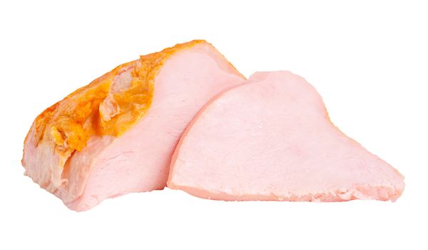 Big whole pieces and sliced turkey breast fillet isolated on white background