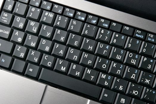 Laptop keyboard closeup. top view