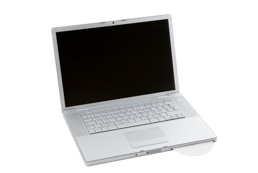 Silver portable computer with CD inserted. 3/4 view.
