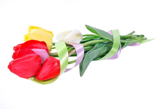 Beautyful bouquet of yellow, red and white tulips with tape isolated on a white background