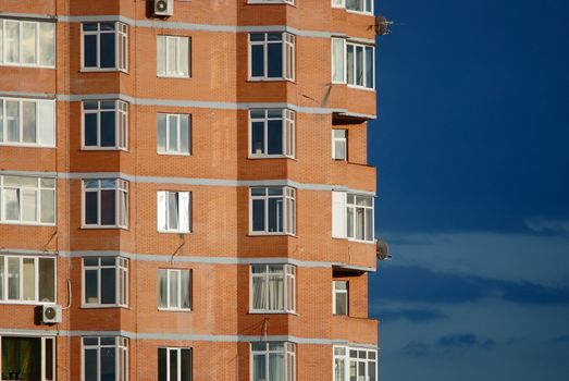 Architectural abstract of modern multi apartments building in a sunset (recent development)