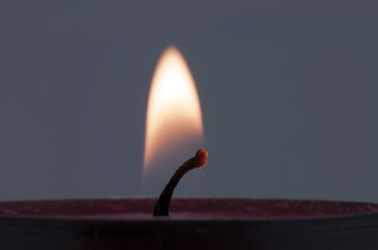 yellow white candle light with dark background