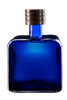 Square blue glass bottle full of tequila. Isolated on white background