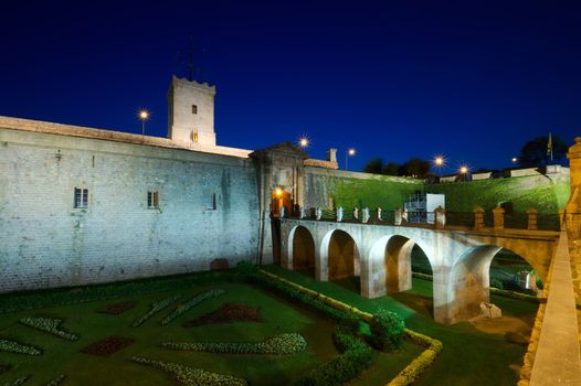 night scene of Montjuic Castle, Barcelona, Spain 