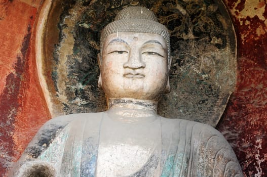 Ancient buddha statue in caves in Sichuan, China