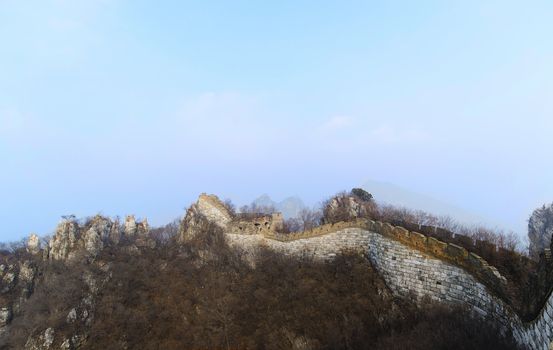 ruins of great wall of china on a foggy day