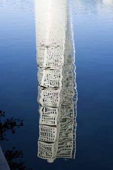 Skyscraper mirroring in the water