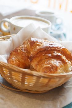 Croissant and a cup of coffee