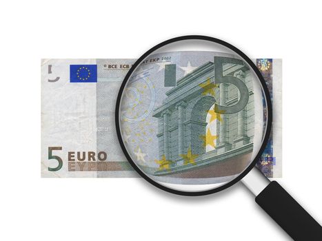 5 Euro Bill and a mangnifying glass in white background. 