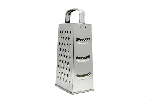 metal grater for vegetables and fruit products on a white background