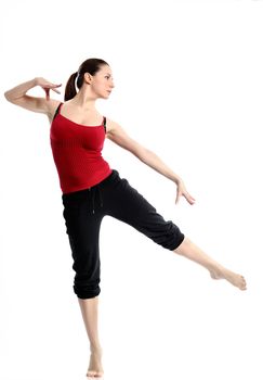 Girl in sportswear doing sport exercises. Isolated over white background.