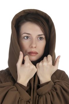Sad young woman holding her hood