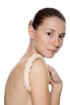 Portrait of young beautiful woman with a thick rope. Isolated on white background