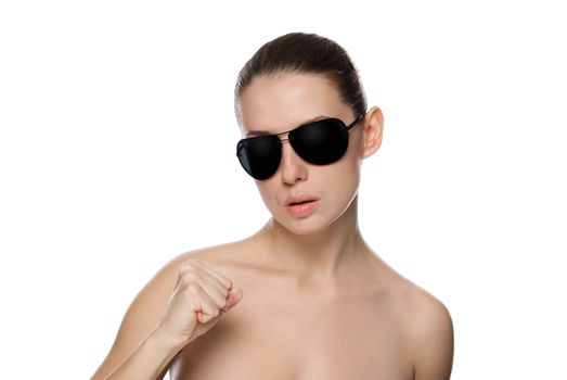 Portrait of glamour woman in sunglasses. Isolated on white background