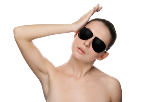 Portrait of glamour woman in sunglasses. Isolated on white background
