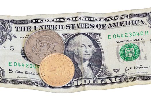 Contrast of the US dollar and half dollar coin with a worn paper bill