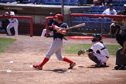 BINGHAMTON, NY - JUNE 14: Reading Phillies Tim Kennelly takes a big swing during a game against the Binghamton Mets at NYSEG Stadium on June 14, 2012 in Binghamton, NY