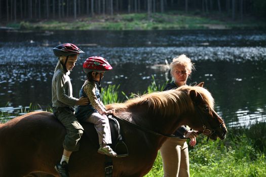 Girls on horse in a forest in denmark