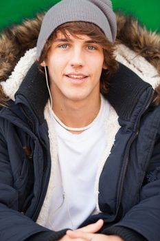 young handsome man portrait with headphones