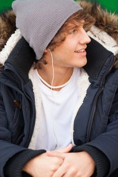 young handsome man portrait with headphones