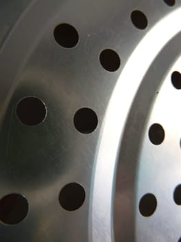 closeup on a piece of punched metal