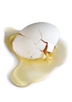 Broken egg on white background