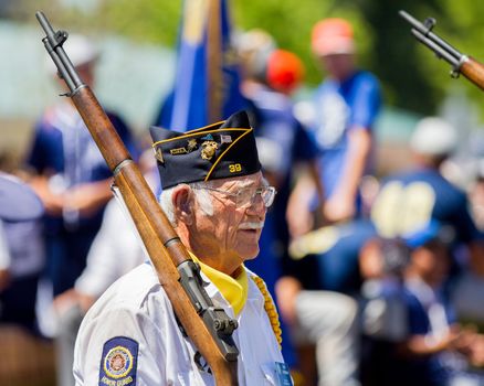 Middleton, Idaho July 4th 2012 - Pat Oatman from the Middleton Idaho Post 39 Honor Guard marching in the 4th of july parade.