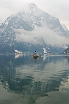 a boat on the lake in Hallstatt in the winter, Austria