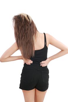 Closeup of young woman suffering from back pain