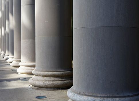 Row of large stone or concrete Diminishing Columns of a building