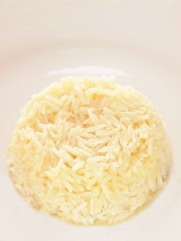 close up of a plate of buttered rice