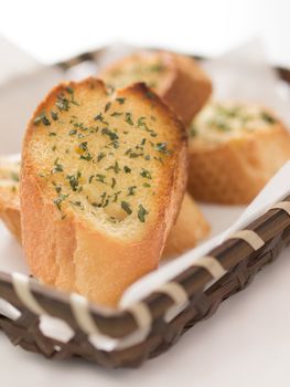 close up of a basket of garlic bread