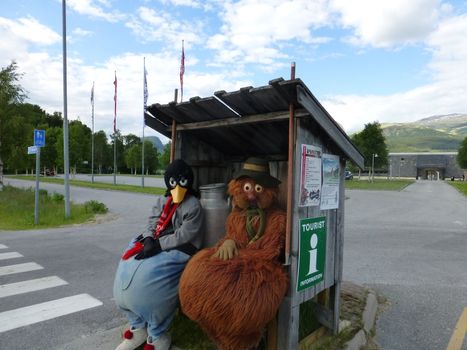 Ludvig and Solan on the milkstand in Alvdal.Two figures from famous Kjell Aukrusts animated film Il Tempo Gigante