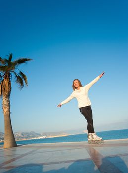 Enjoying a sunny afternoon skating alongside the Mediterranean