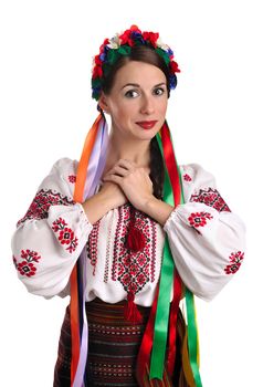 Portrait of joyful young Ukrainian woman in national costume. Isolated on white background